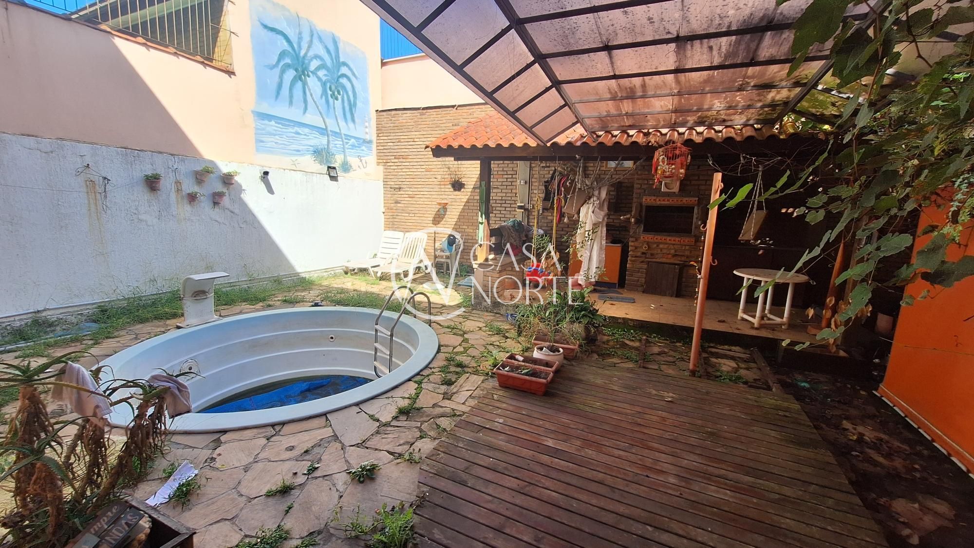 Casa à venda com 5 quartos, 175m², 1 vaga, Rua Santos Neto no bairro Petrópolis em Porto Alegre