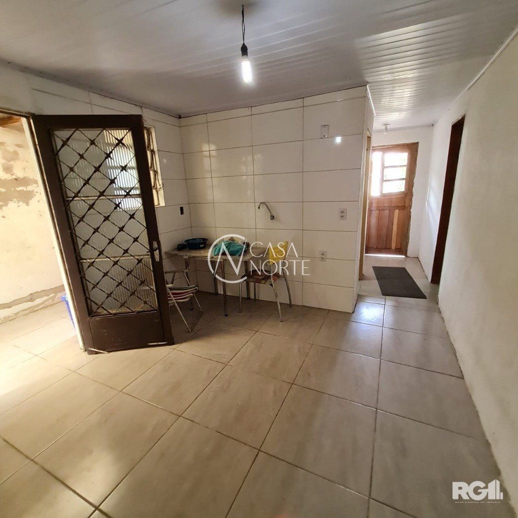 Casa à venda com 3 quartos, 105m², 1 vaga, Avenida Luiz Moschetti no bairro Vila João Pessoa em Porto Alegre