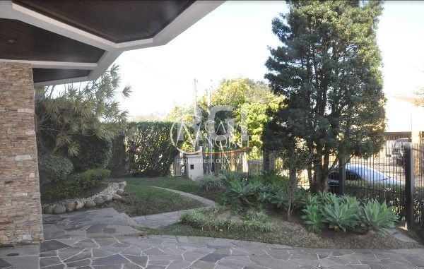 Casa à venda com 5 quartos, 408m², 2 suítes, 3 vagas, Rua Dona Lida Monteiro no bairro Teresópolis em Porto Alegre