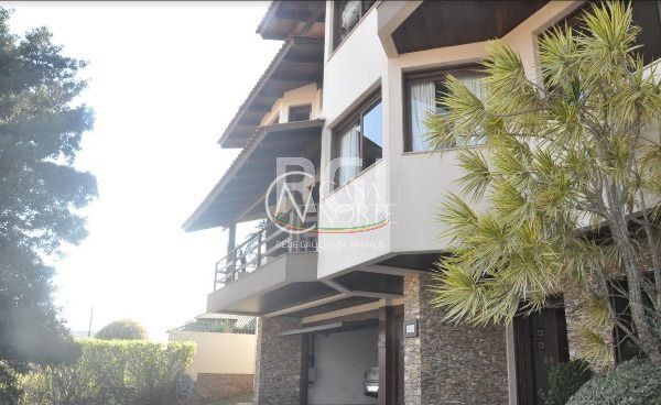 Casa à venda com 5 quartos, 408m², 2 suítes, 3 vagas, Rua Dona Lida Monteiro no bairro Teresópolis em Porto Alegre