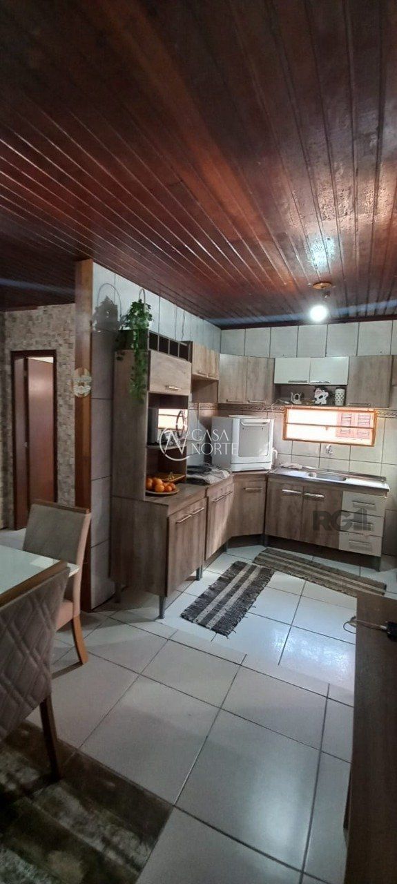 Casa à venda com 3 quartos, 120m², 2 vagas, Rua D no bairro Lami em Porto Alegre