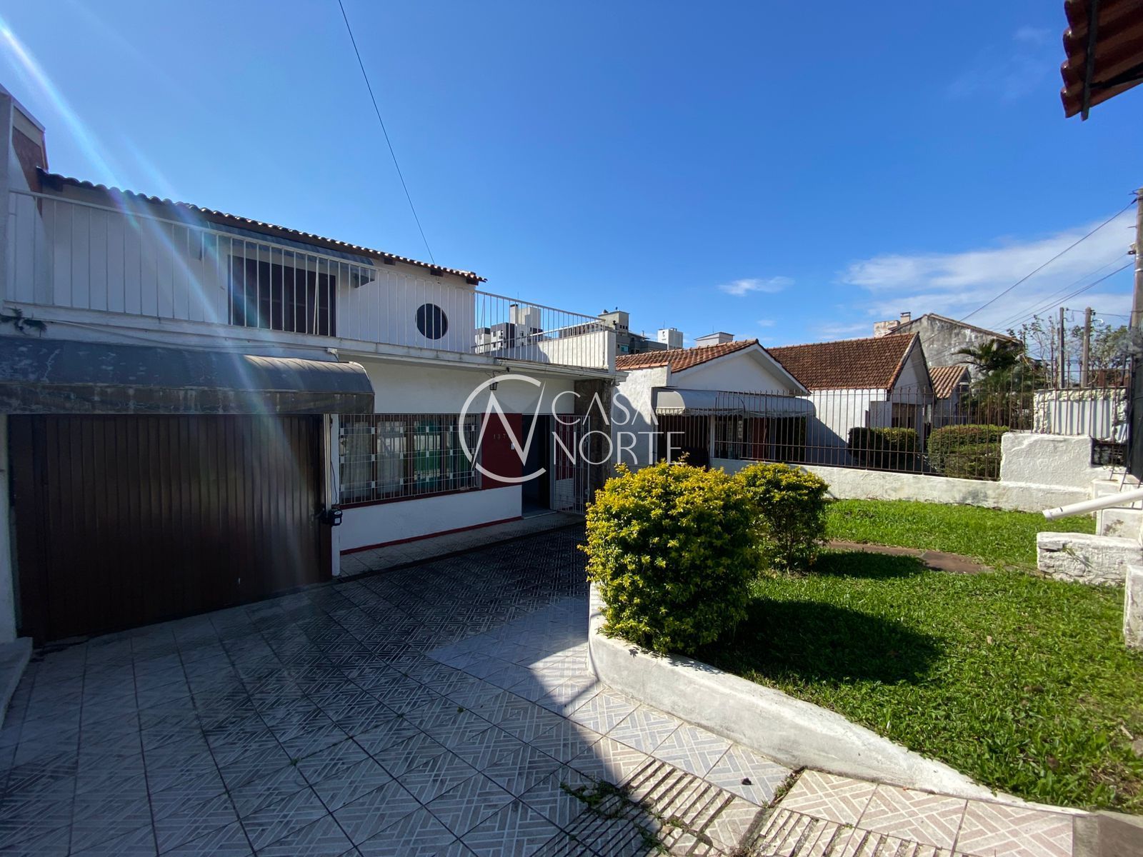 Casa à venda com 3 quartos, 2 suítes, 2 vagas, Rua Doutor Mário Totta no bairro Tristeza em Porto Alegre