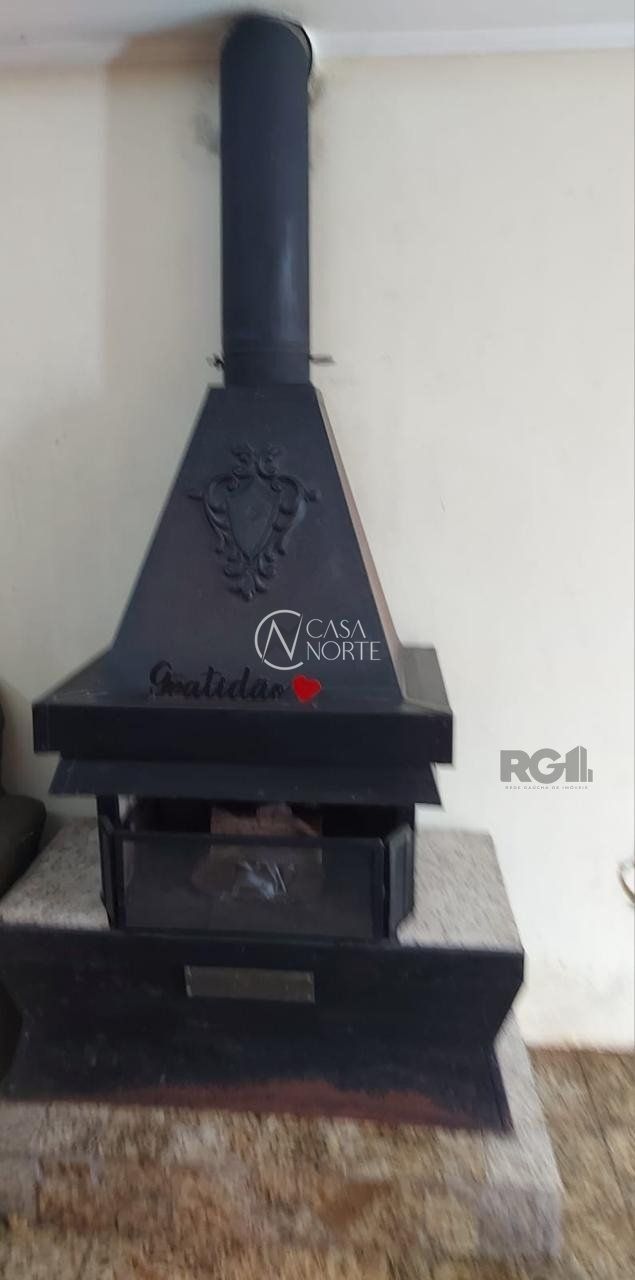 Casa à venda com 4 quartos, 269m², 1 suíte, 2 vagas, Rua Júlio Dias de Souza no bairro Aberta dos Morros em Porto Alegre