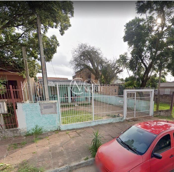 Casa à venda com 3 quartos, 482m², 3 vagas, Rua Professor Joaquim Louzada no bairro Camaquã em Porto Alegre