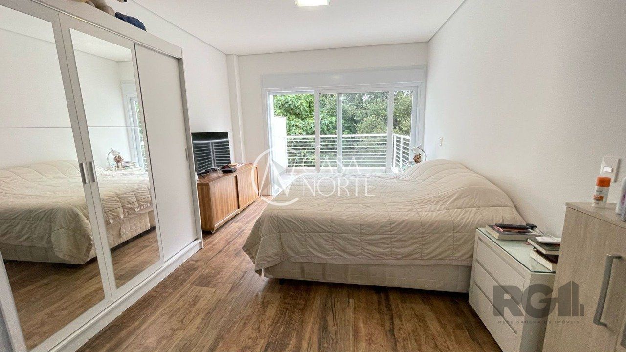 Casa de Condomínio à venda com 3 quartos, 438m², 3 suítes, 2 vagas, Rua Doutor Ney de Castilhos Ferreira no bairro Pedra Redonda em Porto Alegre