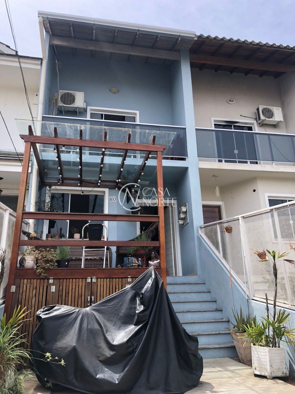 Casa à venda com 3 quartos, 107m², 2 suítes, 1 vaga, Rua Doutor Claudio Walter Ferreira da Silva no bairro Guarujá em Porto Alegre