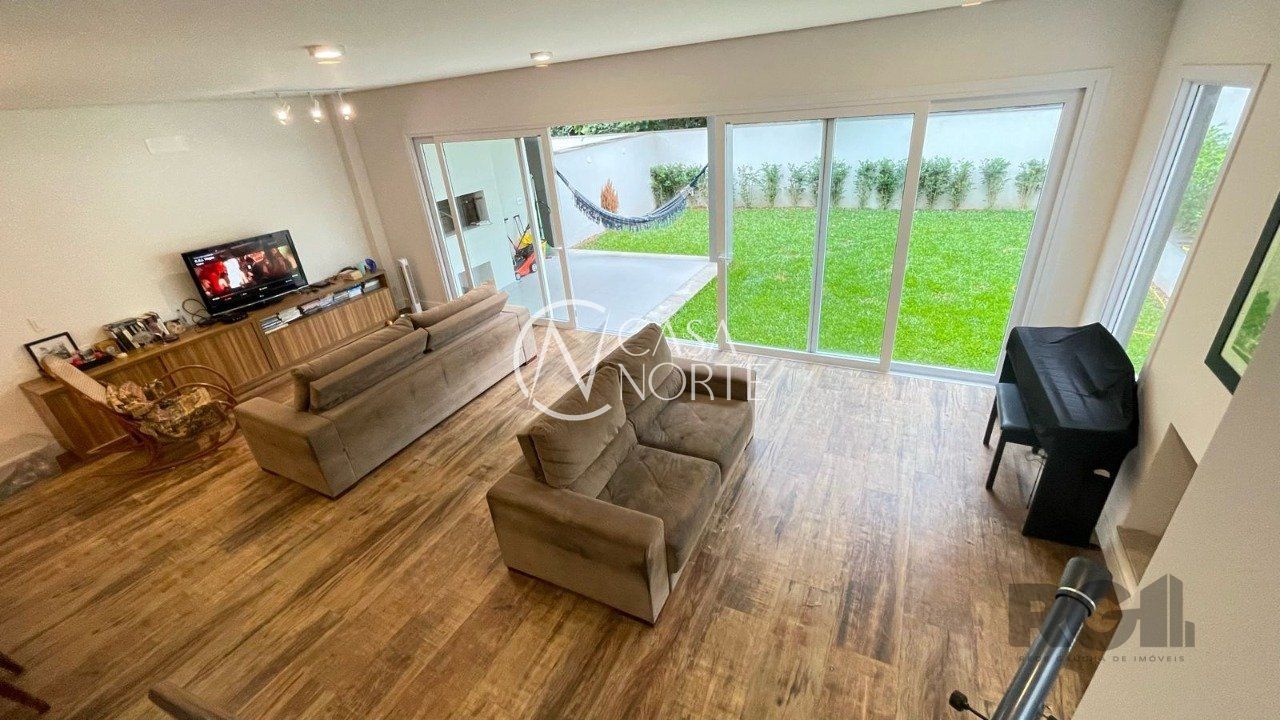 Casa de Condomínio à venda com 3 quartos, 438m², 3 suítes, 2 vagas, Rua Doutor Ney de Castilhos Ferreira no bairro Pedra Redonda em Porto Alegre