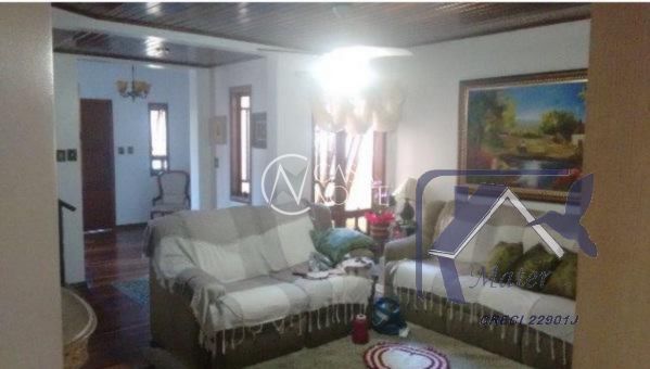 Casa à venda com 4 quartos, 318m², 1 suíte, 4 vagas, Avenida José Correa da Silva no bairro Cavalhada em Porto Alegre