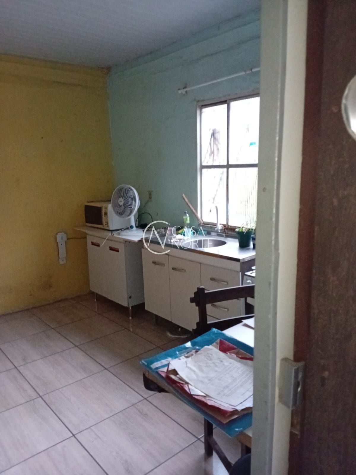 Casa à venda com 4 quartos, 215m², 1 vaga, Rua Doze de Outubro no bairro Partenon em Porto Alegre