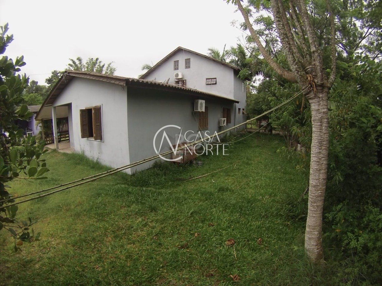 Casa à venda com 5 quartos, 230m², 2 suítes, 1 vaga, Rua Santa Monica no bairro Ponta Grossa em Porto Alegre