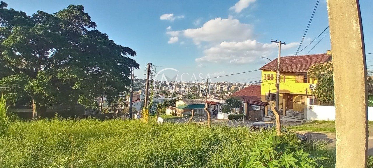 Terreno à venda  com 2468m², Rua Taveira Junior no bairro Nonoai em Porto Alegre