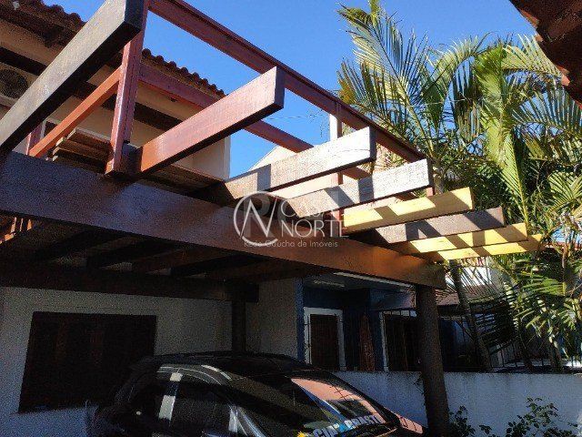 Casa à venda com 2 quartos, 105m², 1 suíte, 2 vagas, Rua Silvestre Sauter no bairro Hípica em Porto Alegre