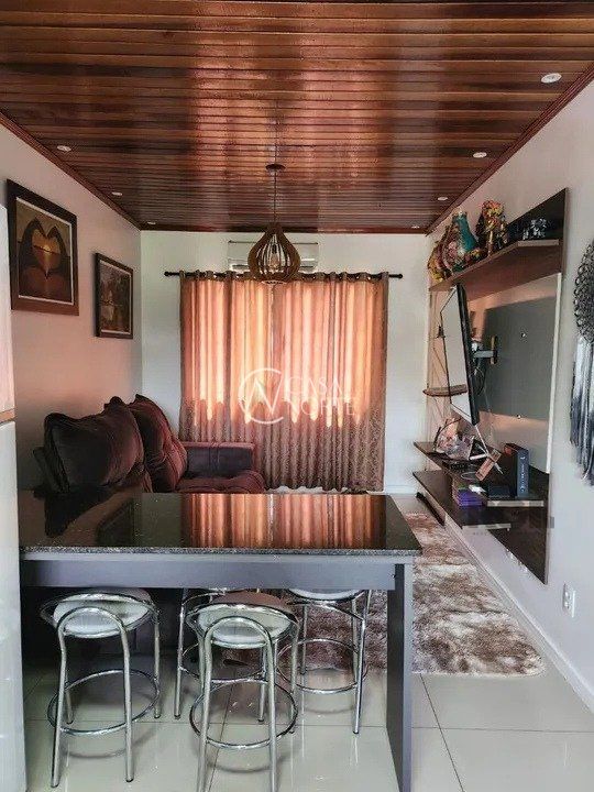 Casa à venda com 4 quartos, 97m², 1 suíte, 7 vagas, Rua Sargento Manoel Arruda no bairro Jardim Carvalho em Porto Alegre