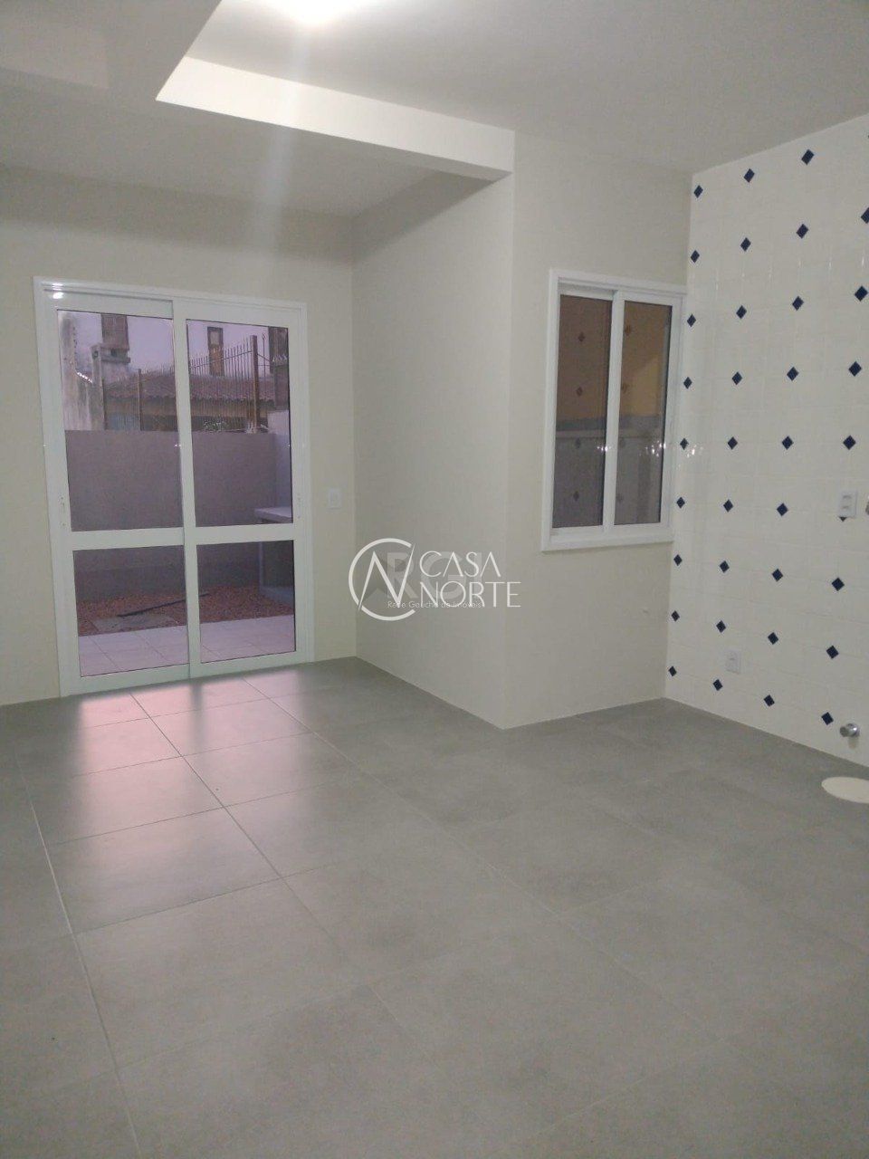 Casa à venda com 3 quartos, 122m², 1 suíte, 2 vagas, Rua Itacyr Rossi no bairro Guarujá em Porto Alegre