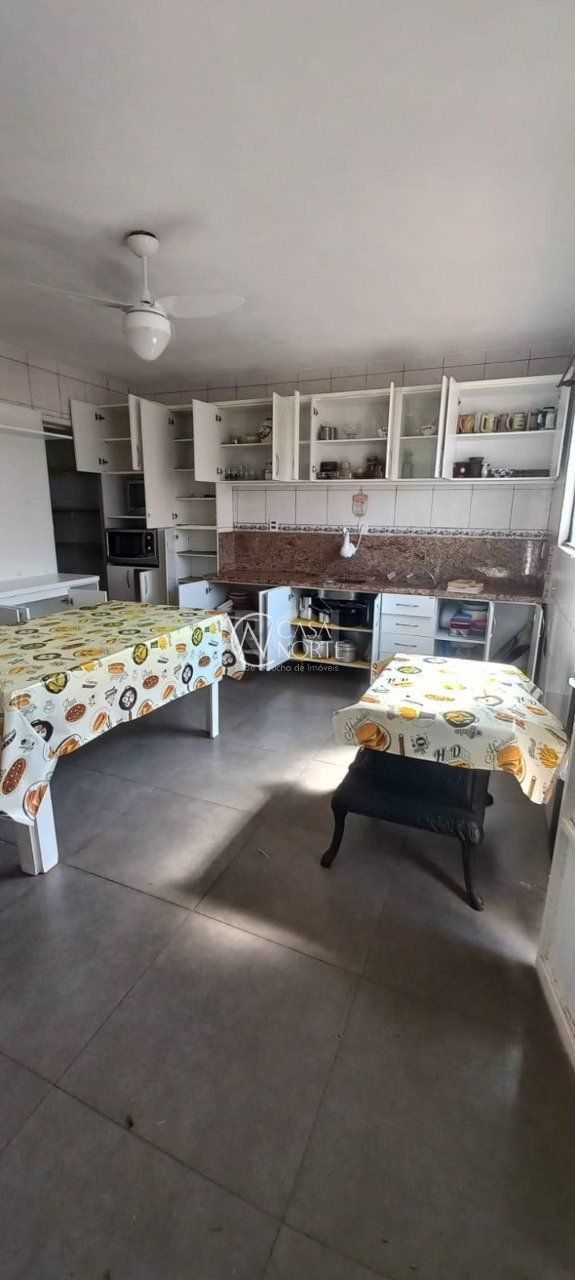 Casa à venda com 4 quartos, 149m², 2 vagas, Rua da Roseira no bairro Campo Novo em Porto Alegre