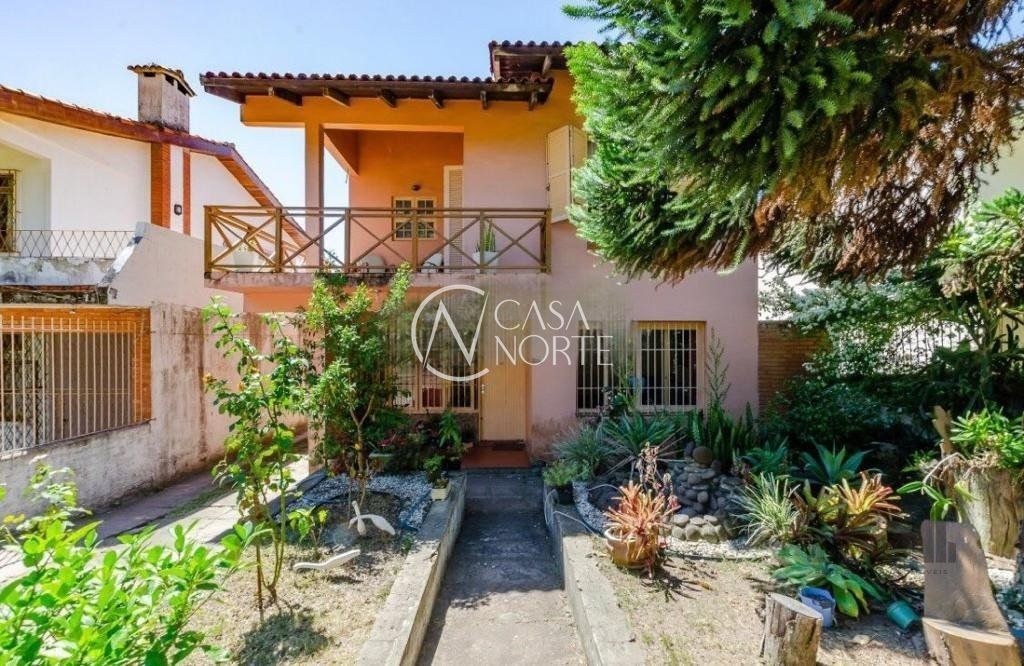 Casa à venda com 6 quartos, 408m², 1 suíte, 6 vagas, Rua Padre João Batista Reus no bairro Vila Conceição em Porto Alegre