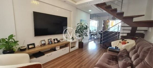 Casa à venda com 2 quartos, 95m², 2 suítes, 1 vaga, Rua Eroni Soares Machado no bairro Hípica em Porto Alegre