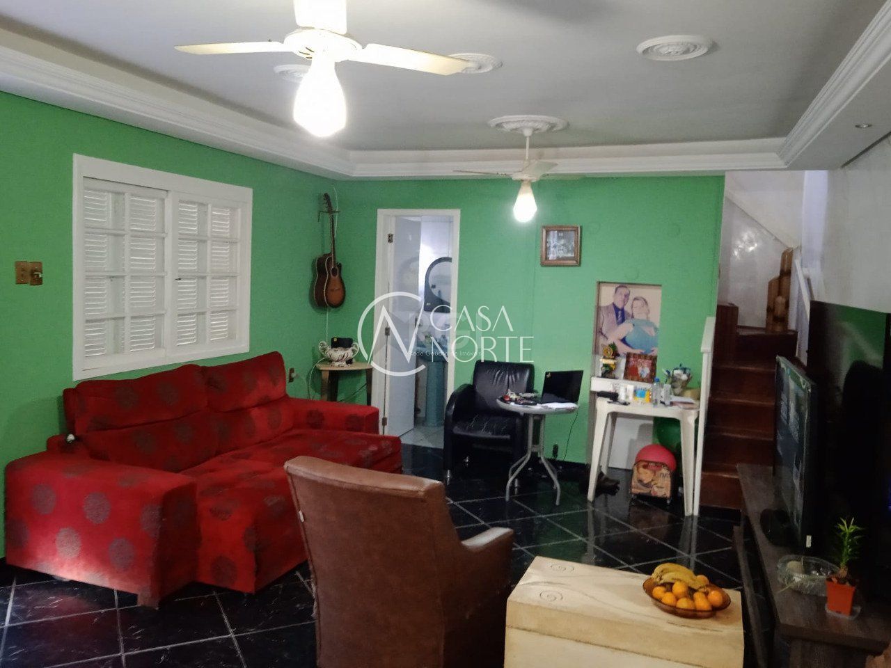 Casa à venda com 2 quartos, 100m², 1 suíte, 2 vagas, Rua Enio de Souza, no bairro Vila Nova em Porto Alegre