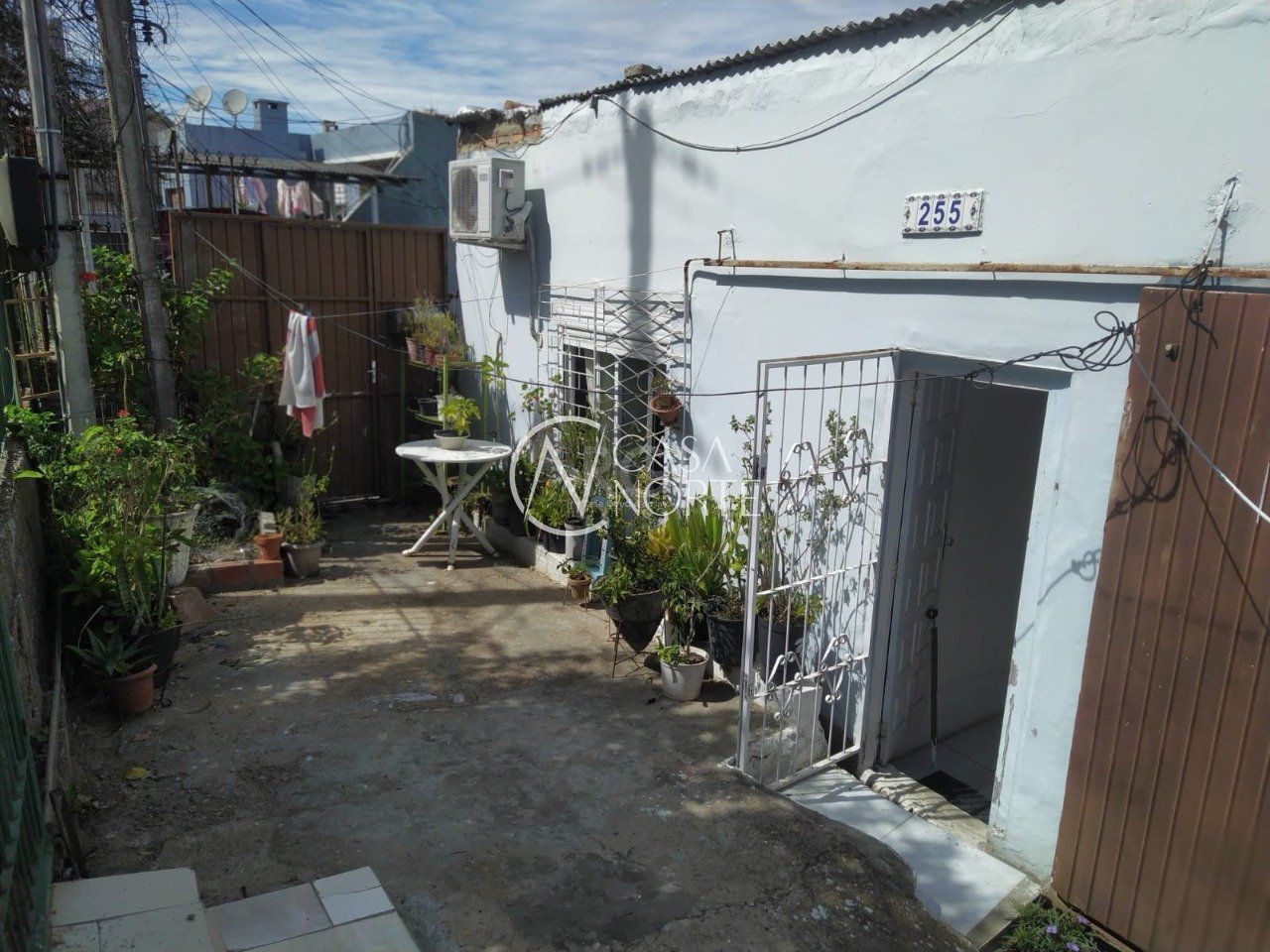 Casa à venda com 5 quartos, 270m², 2 suítes, 2 vagas, Rua Aristides Rosa no bairro Jardim Carvalho em Porto Alegre