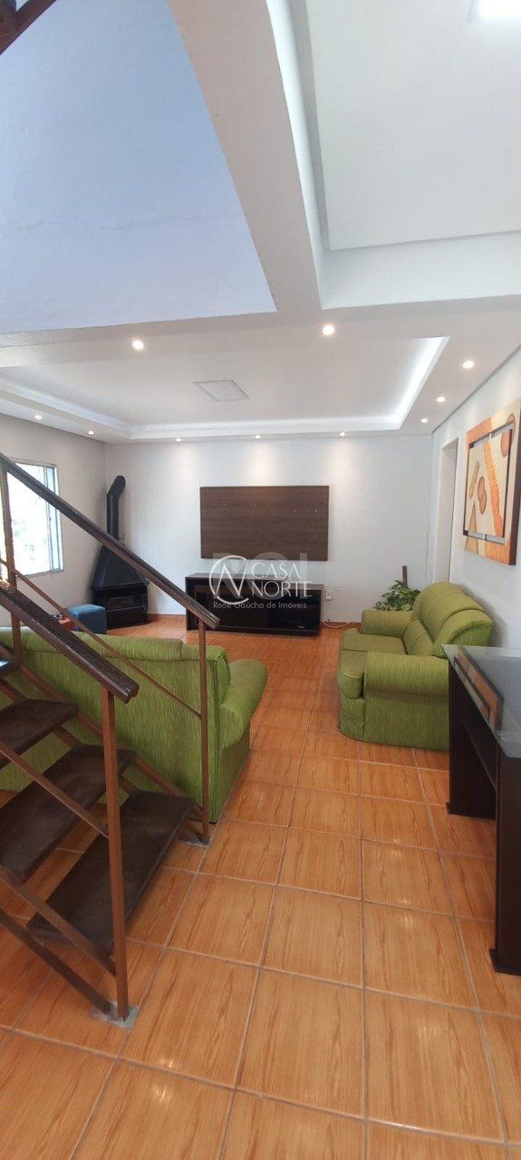 Casa à venda com 4 quartos, 149m², 2 vagas, Rua da Roseira no bairro Campo Novo em Porto Alegre