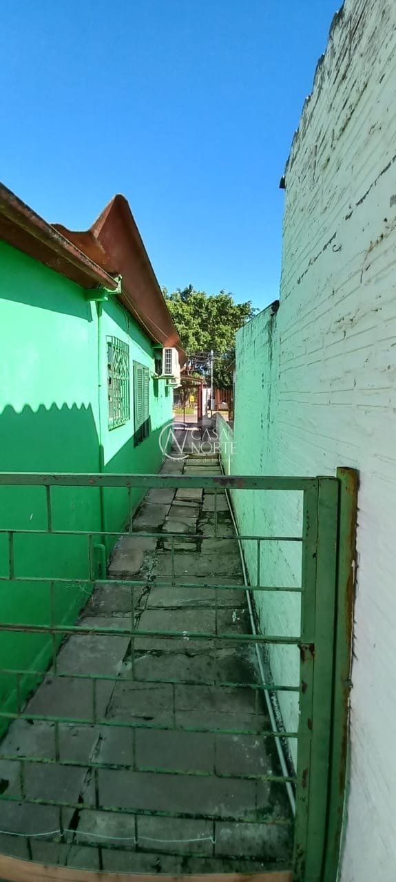 Casa à venda com 5 quartos, 336m², 1 suíte, 2 vagas, Rua Olavio José de Souza no bairro Belém Novo em Porto Alegre