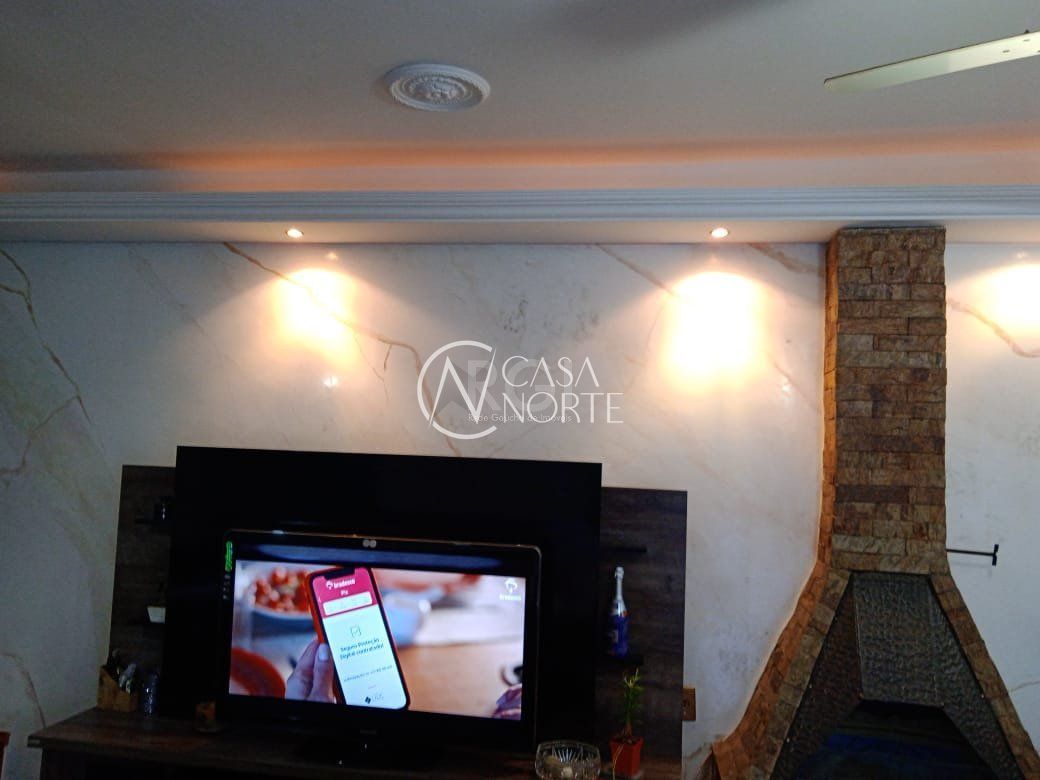 Casa à venda com 2 quartos, 100m², 1 suíte, 2 vagas, Rua Enio de Souza, no bairro Vila Nova em Porto Alegre