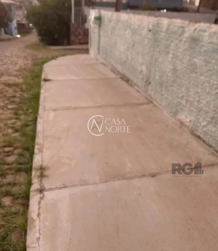 Terreno à venda  com 104m², Rua K no bairro Restinga em Porto Alegre