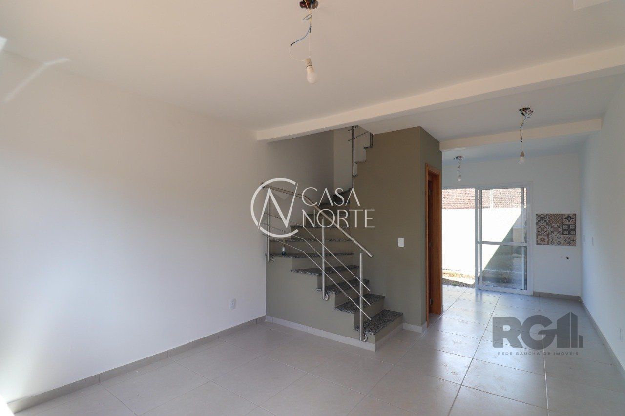 Casa de Condomínio à venda com 2 quartos, 57m², 1 vaga, Rua Miguel Ascoleze no bairro Vila Nova em Porto Alegre