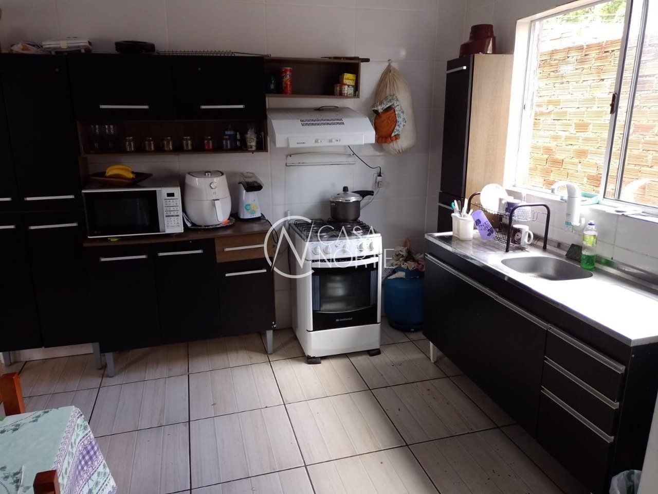 Casa à venda com 4 quartos, 99m², 1 suíte, 8 vagas, Rua Doutor Carlos Walau no bairro Jardim Floresta em Porto Alegre