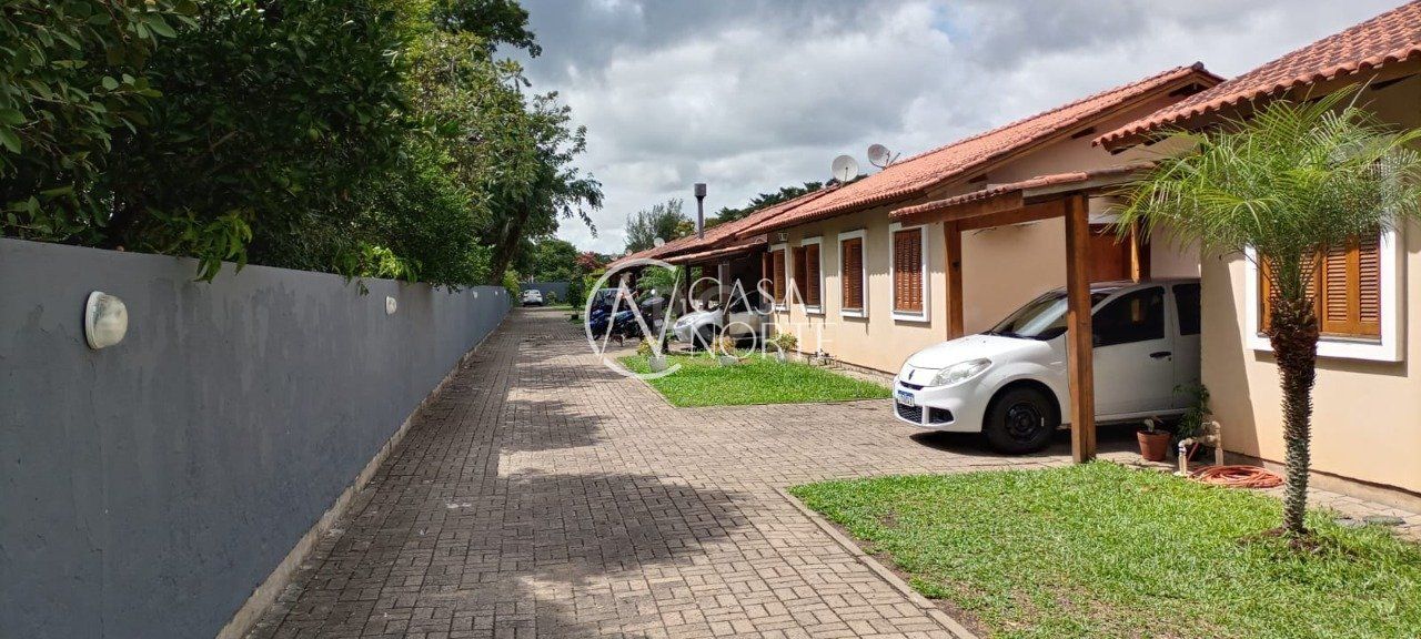 Casa de Condomínio à venda com 2 quartos, 81m², 1 vaga, Rua das Espatodeas no bairro Ponta Grossa em Porto Alegre