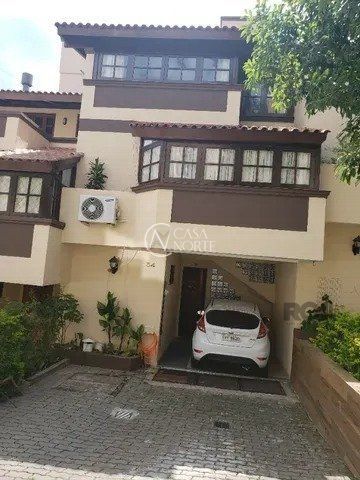 Casa de Condomínio à venda com 2 quartos, 179m², 1 suíte, 2 vagas, Avenida Wenceslau Escobar no bairro Tristeza em Porto Alegre