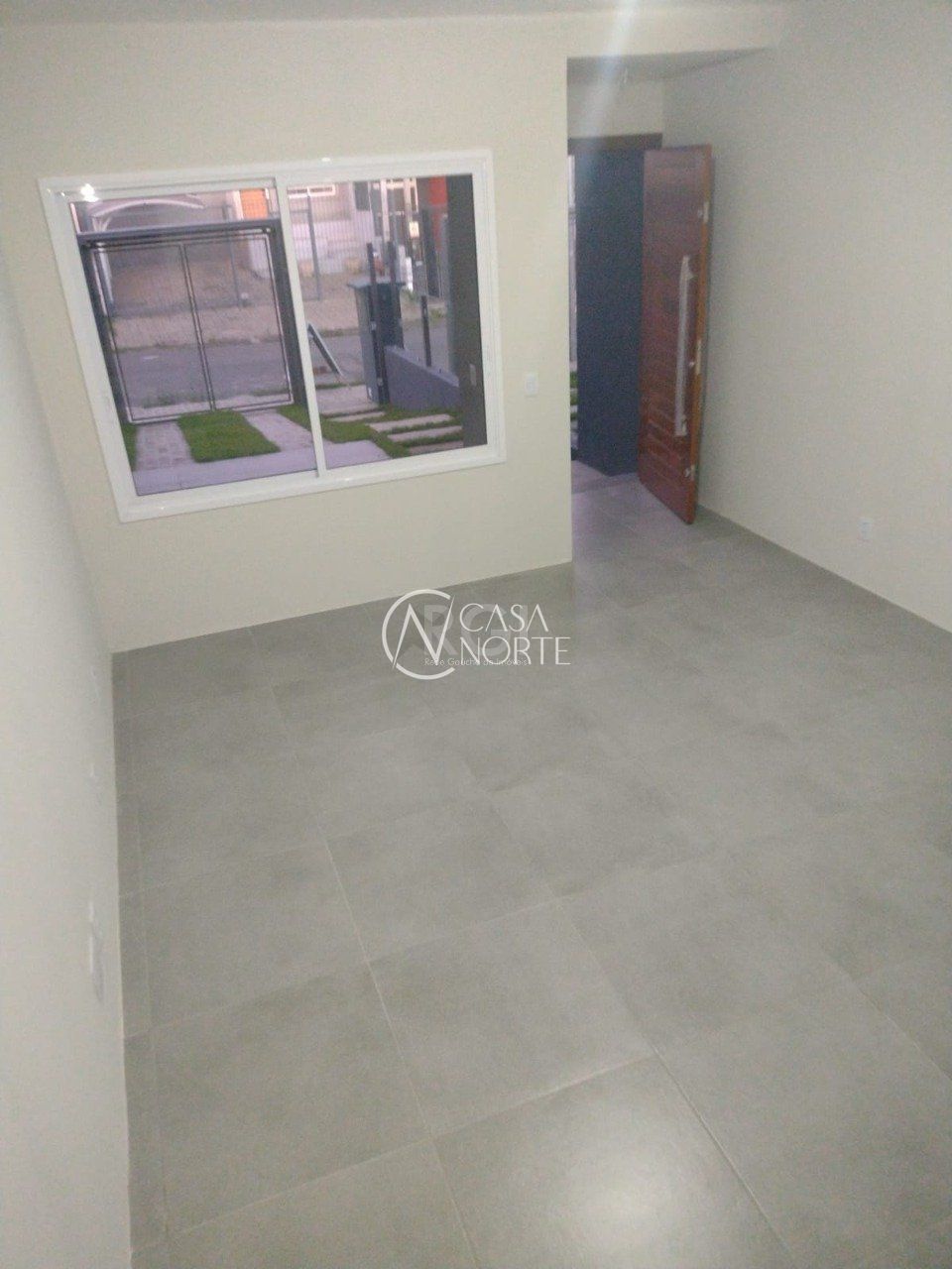 Casa à venda com 3 quartos, 122m², 1 suíte, 2 vagas, Rua Itacyr Rossi no bairro Guarujá em Porto Alegre