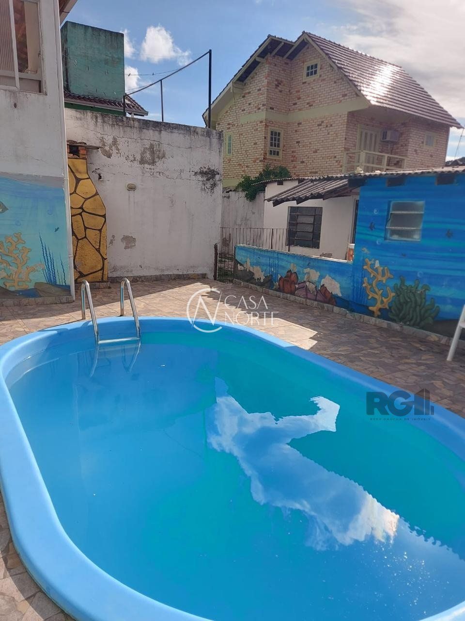 Casa à venda com 4 quartos, 269m², 1 suíte, 2 vagas, Rua Júlio Dias de Souza no bairro Aberta dos Morros em Porto Alegre