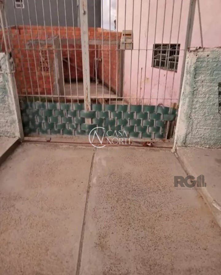 Terreno à venda  com 104m², Rua K no bairro Restinga em Porto Alegre