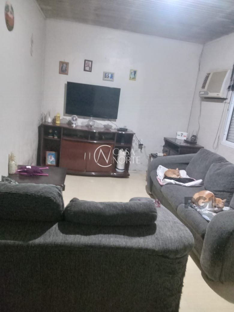 Casa à venda com 2 quartos, 80m², 2 vagas, Rua Engenheiro Oscar de Oliveira Ramos no bairro Restinga em Porto Alegre