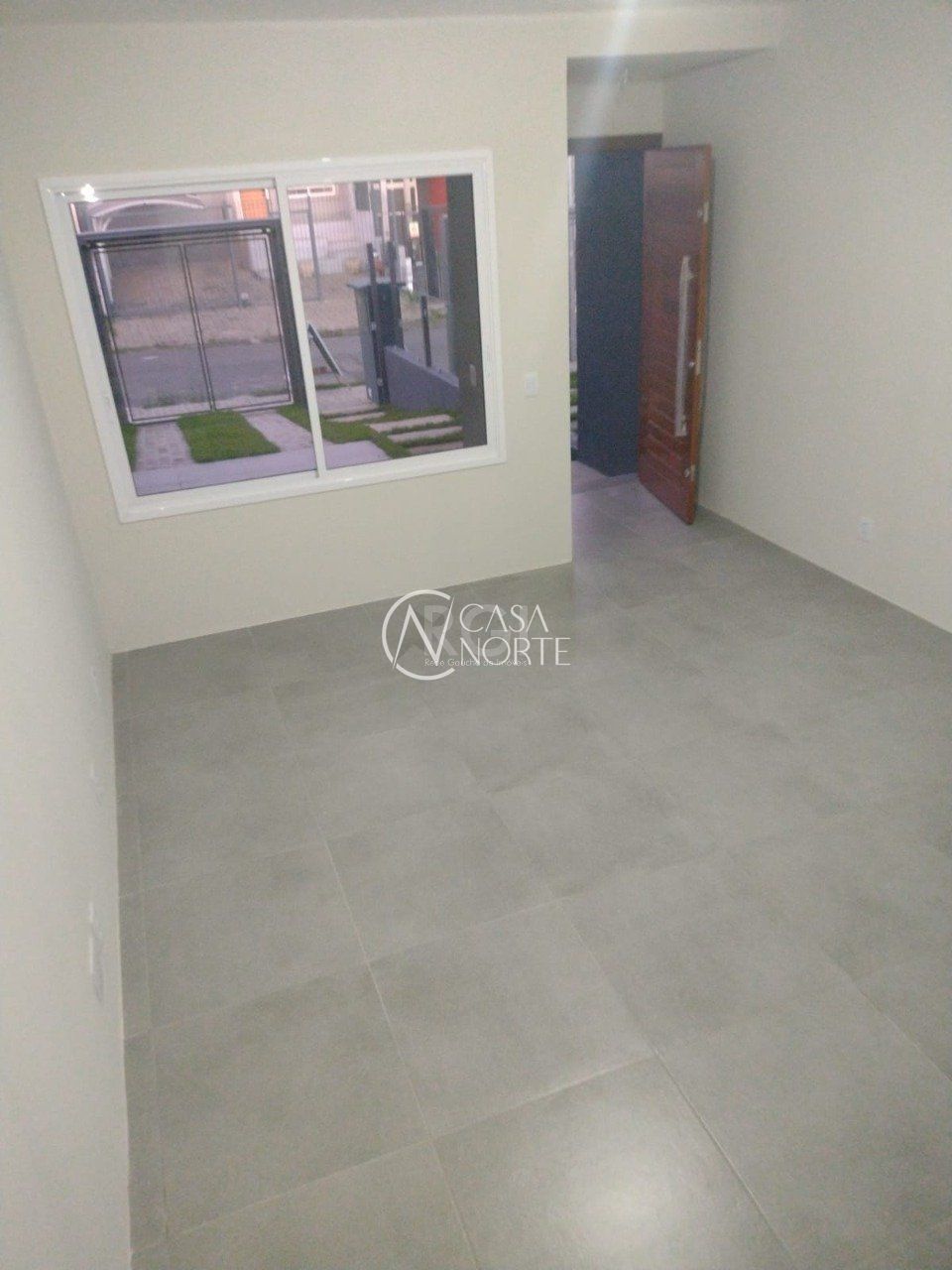 Casa à venda com 3 quartos, 122m², 1 suíte, 2 vagas, Rua Itacyr Rossi no bairro Guarujá em Porto Alegre