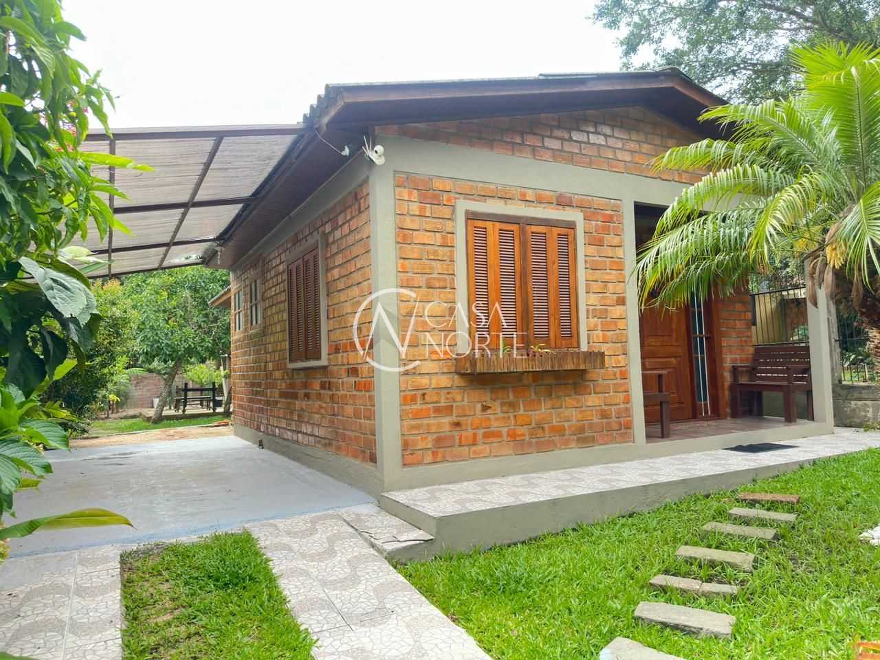 Casa à venda com 2 quartos, 109m², 2 suítes, 3 vagas, Rua Cinco no bairro Lami em Porto Alegre