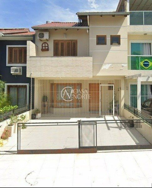 Casa à venda com 3 quartos, 142m², 2 vagas, Rua Alexandre de Gusmão no bairro Hípica em Porto Alegre