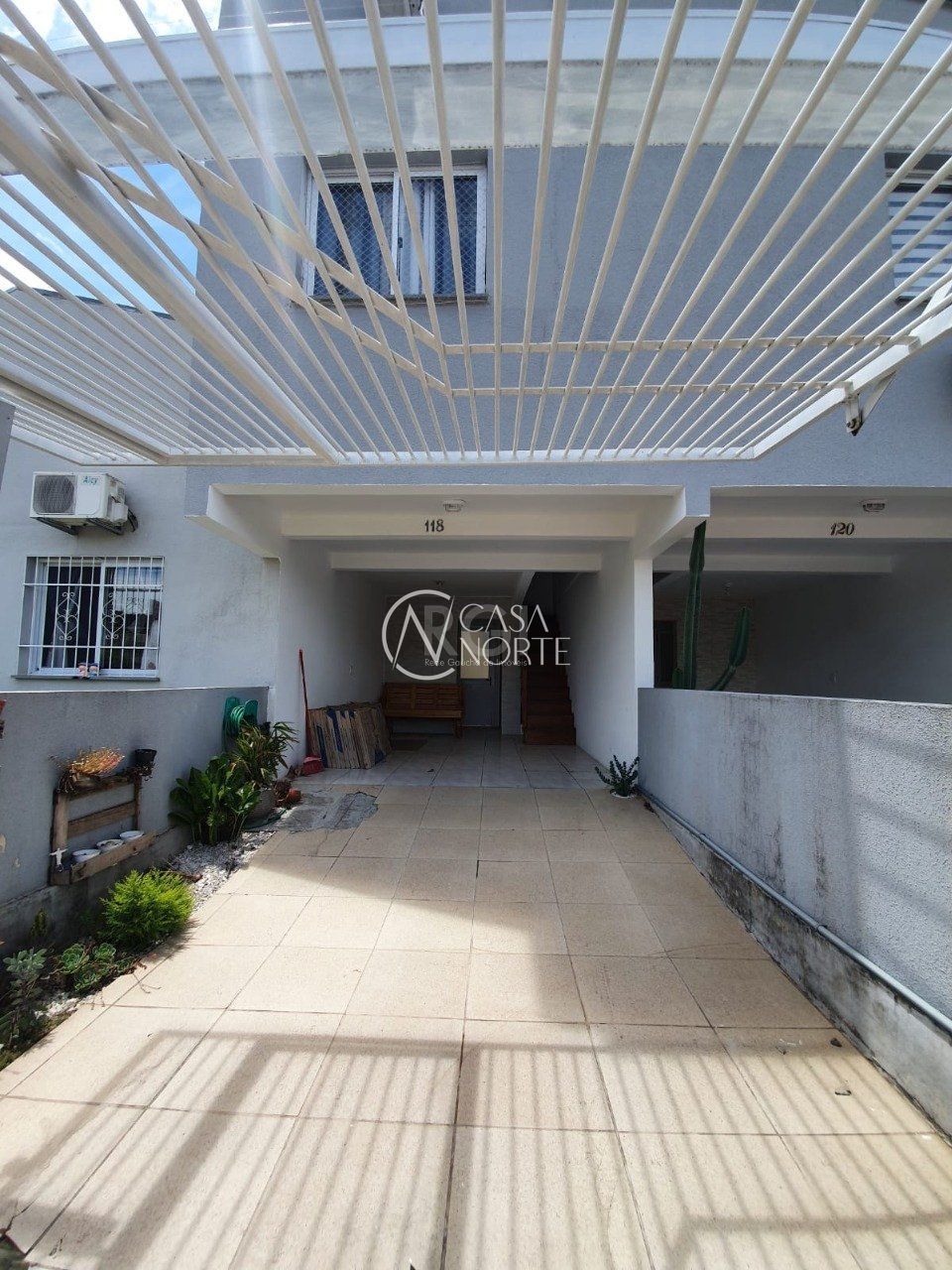 Casa de Condomínio à venda com 2 quartos, 63m², 1 vaga, Rua Dorival Castilhos Machado no bairro Aberta dos Morros em Porto Alegre