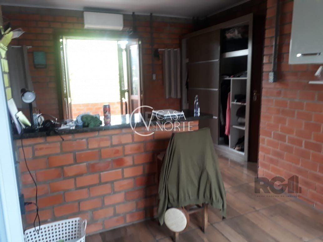 Casa à venda com 3 quartos, 90m², 1 suíte, 2 vagas, Rua Germano Bonow Filho no bairro Hípica em Porto Alegre