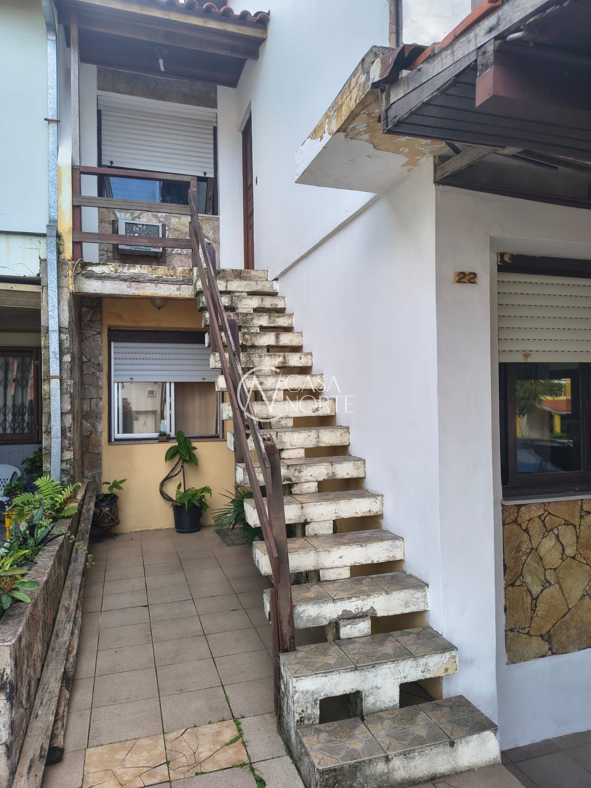 Casa de Condomínio à venda com 5 quartos, 180m², 1 suíte, 2 vagas, Rua Martim Afonso no bairro Santo Antônio em Porto Alegre