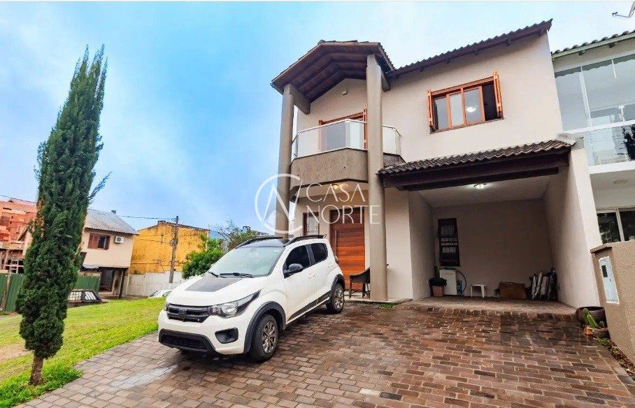 Casa de Condomínio à venda com 3 quartos, 140m², 1 suíte, 2 vagas, Rua Deputado Hugo Mardini no bairro Passo das Pedras em Porto Alegre