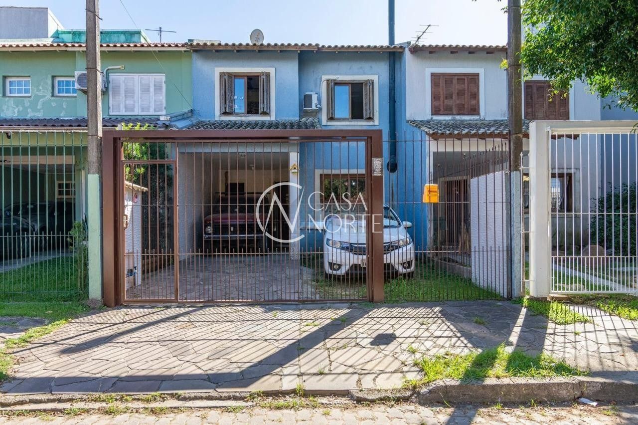 Casa à venda com 3 quartos, 111m², 2 vagas, Rua Rodolpho Espinoza no bairro Hípica em Porto Alegre