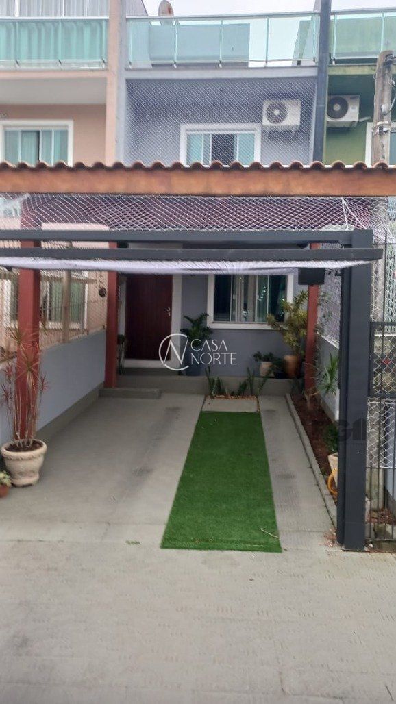 Casa à venda com 2 quartos, 83m², 2 suítes, 1 vaga, Rua Doutor Claudio Walter Ferreira da Silva no bairro Guarujá em Porto Alegre