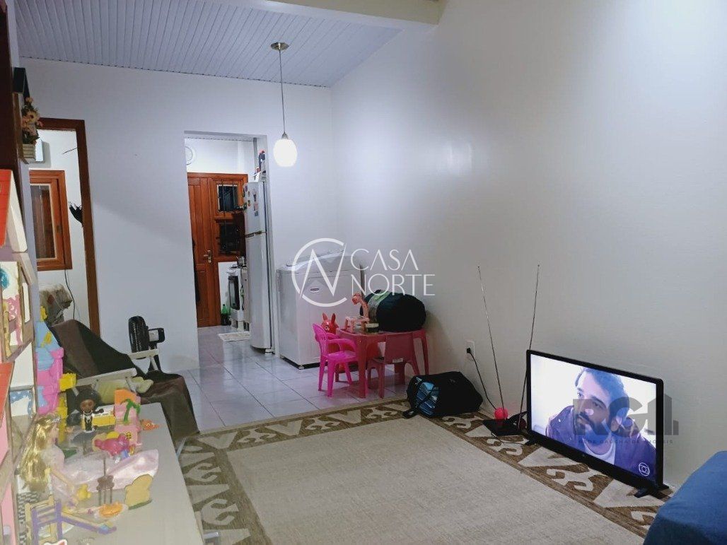Casa à venda com 2 quartos, 125m², 1 vaga, Rua do Schneider no bairro Hípica em Porto Alegre