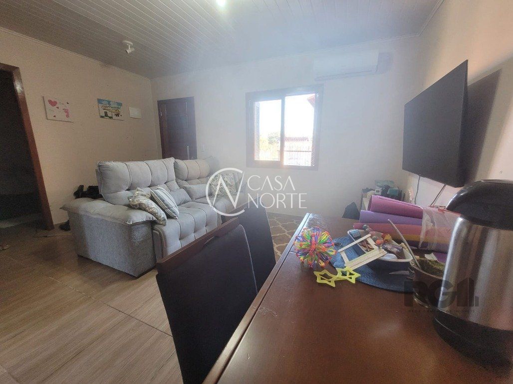 Casa à venda com 3 quartos, 110m², 2 vagas, Rua Antônio Ribeiro Messias no bairro Hípica em Porto Alegre