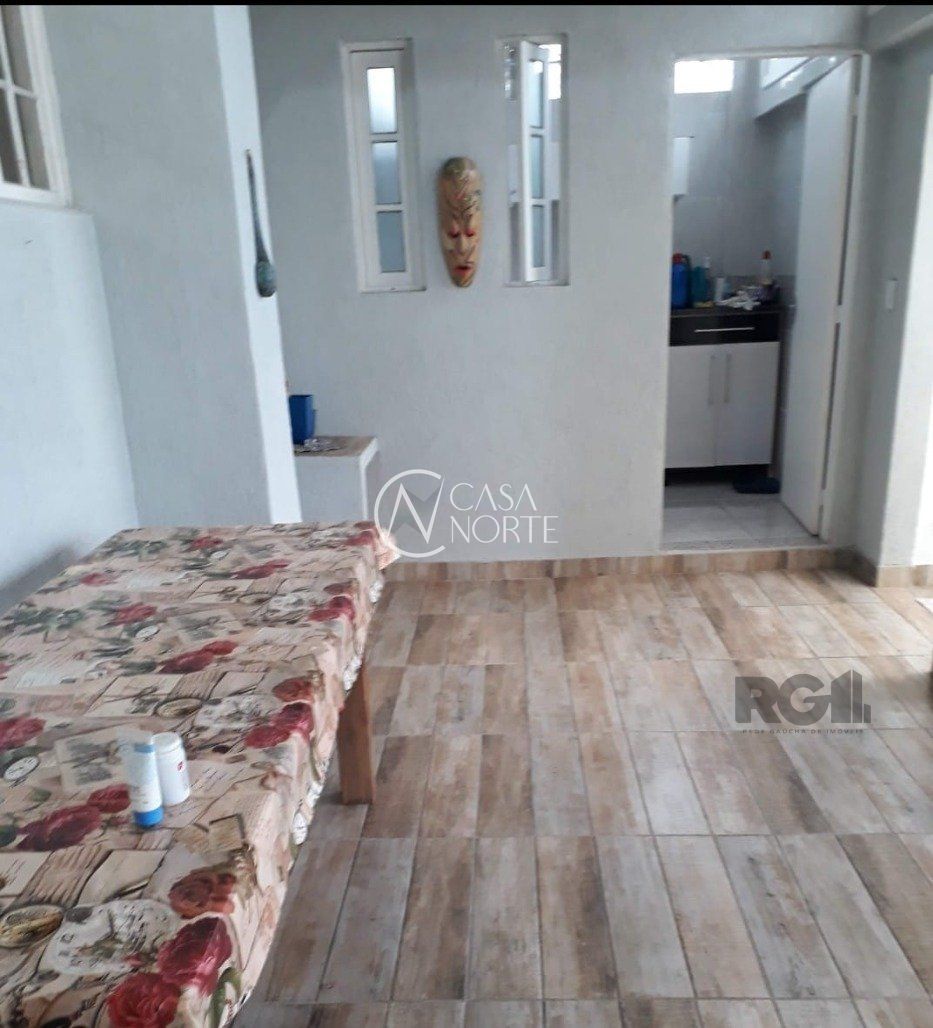 Casa à venda com 4 quartos, 330m², 2 suítes, 3 vagas, Rua Homero Só Jobim no bairro Ipanema em Porto Alegre