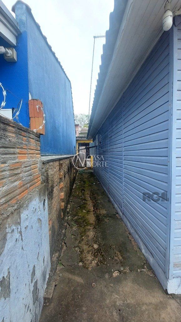 Casa à venda com 2 quartos, 100m², 2 vagas, Rua Itacurubi no bairro Vila Nova em Porto Alegre