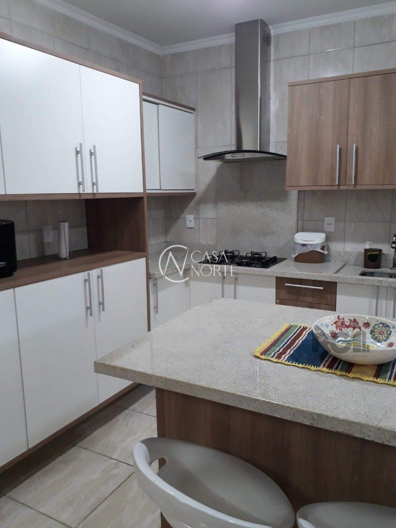 Casa à venda com 4 quartos, 330m², 2 suítes, 3 vagas, Rua Homero Só Jobim no bairro Ipanema em Porto Alegre