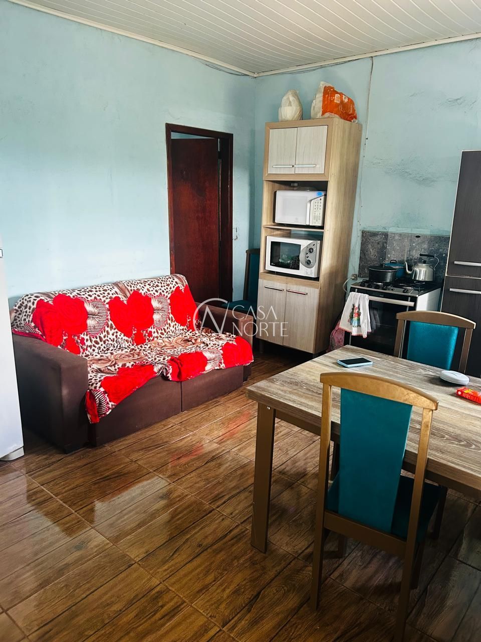 Casa à venda com 2 quartos, 102m², 1 vaga, Rua I no bairro Restinga em Porto Alegre
